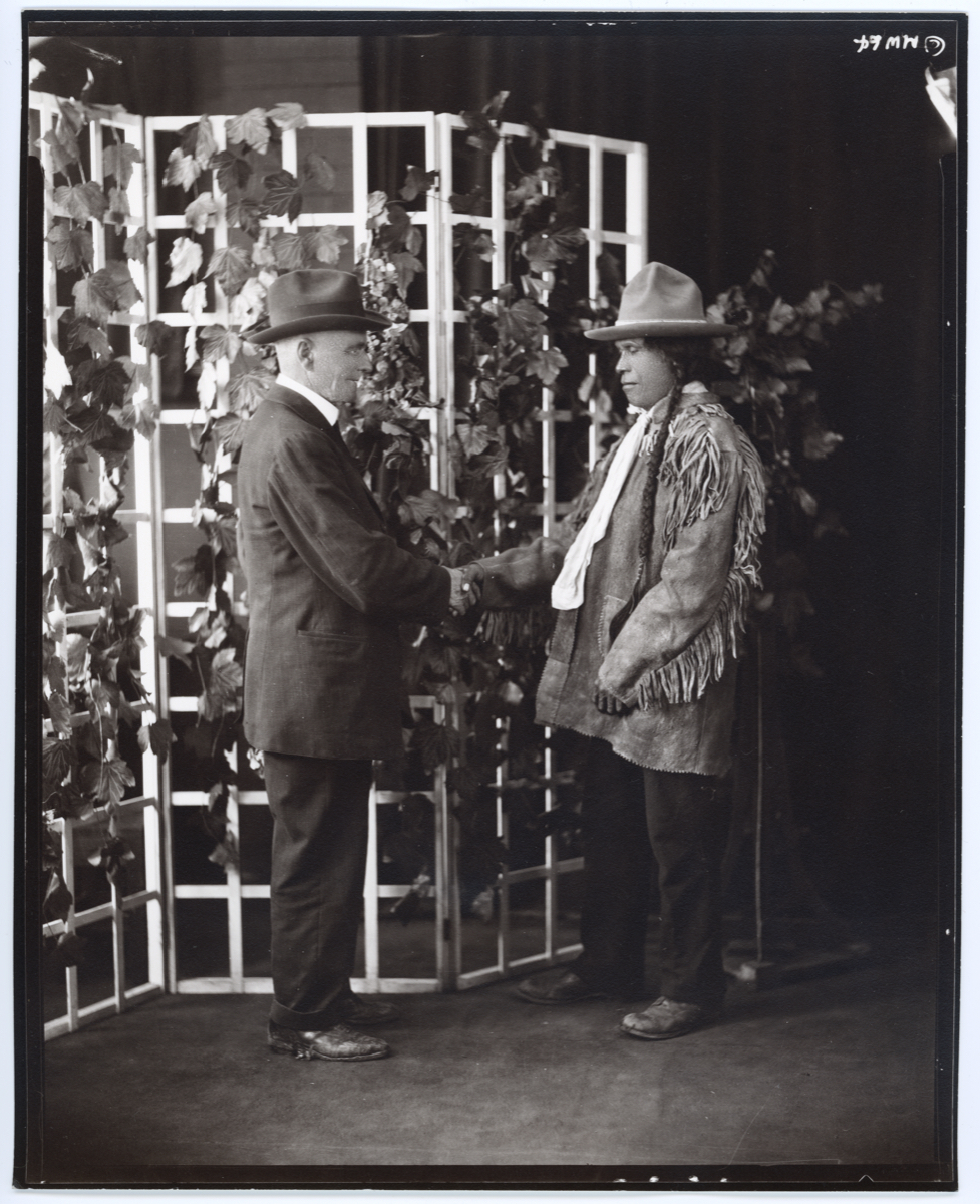 photograph ; (MW64) Two Men shaking hands