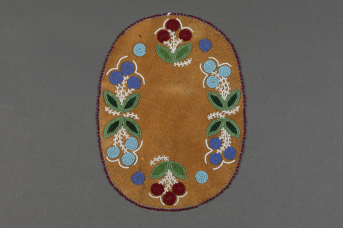 Beaded leather mat