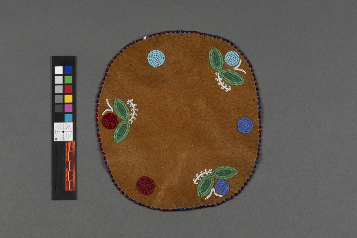 Beaded leather mat