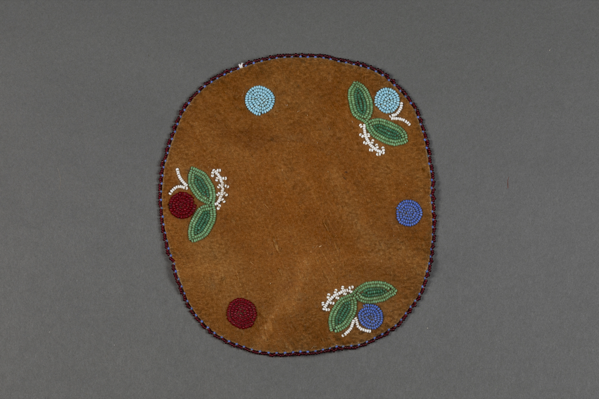 Beaded leather mat